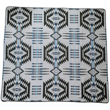 Load image into Gallery viewer, Patterned blanket with geometric design on a white background