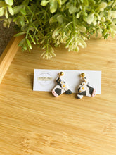 Load image into Gallery viewer, Clay by Day Designs - Floral Crown Cow. Country western - polymer clay earring : Black with Daisies-Clay by Day Designs-Evolution Equestrian Co.
