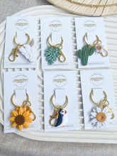 Load image into Gallery viewer, Clay by Day Designs - Polymer Clay Keychains - Puffin, Boho, Sunflower, Skull: Cactus w/flower-Clay by Day Designs-Evolution Equestrian Co.
